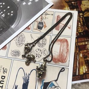 Vintage Fossil Gnome Charm Necklace